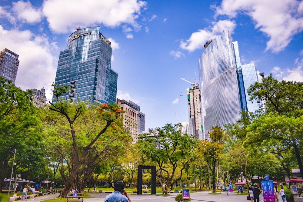 guide to buying property for foreigners in the philippines cityscape skyline city makati metro manila philippinesayala triangle