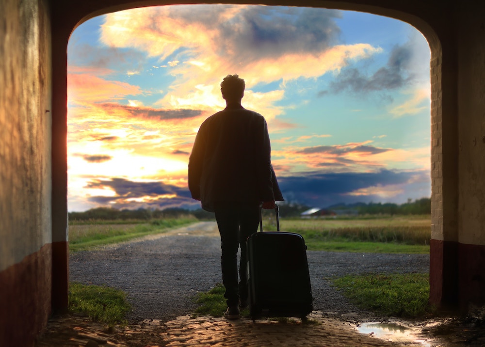 guide to buying property for foreigners in the philippines man travel luggage