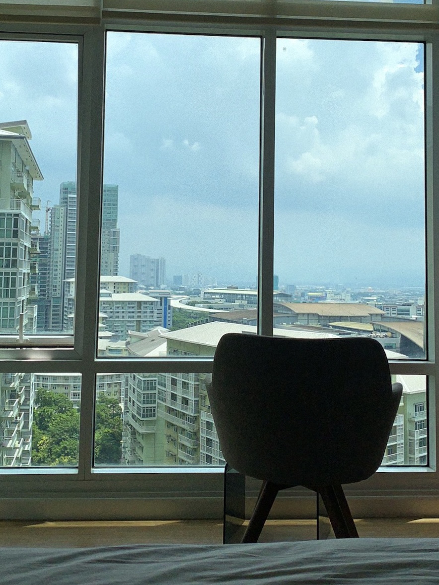Light filled home in BGC big studio with pop out window and floor to ceiling windows