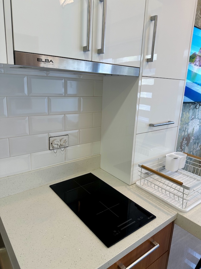 rare digest kitchen must haves to thrive in condo living photo of elba kitchen induction cooktop and rangehood in eton parkview greenbelt legazpi village makati
