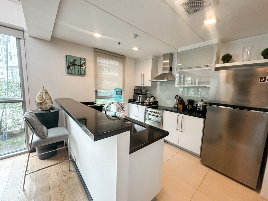 rare digest kitchen must haves to thrive in condo living photo of one serendra east tower kitchen in a beautiful apartment in metro manila bgc bonifacio global city taguig for rent or for sale