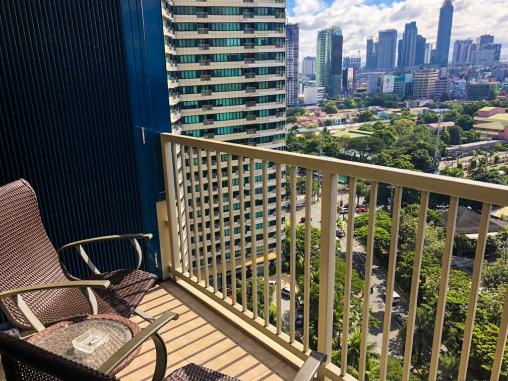 rare digest rockwell vs bgc what it feels like to live in rockwell makati balcony overlooking greenery