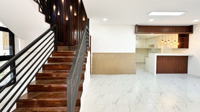 south forbes villas house for sale stairs and living room