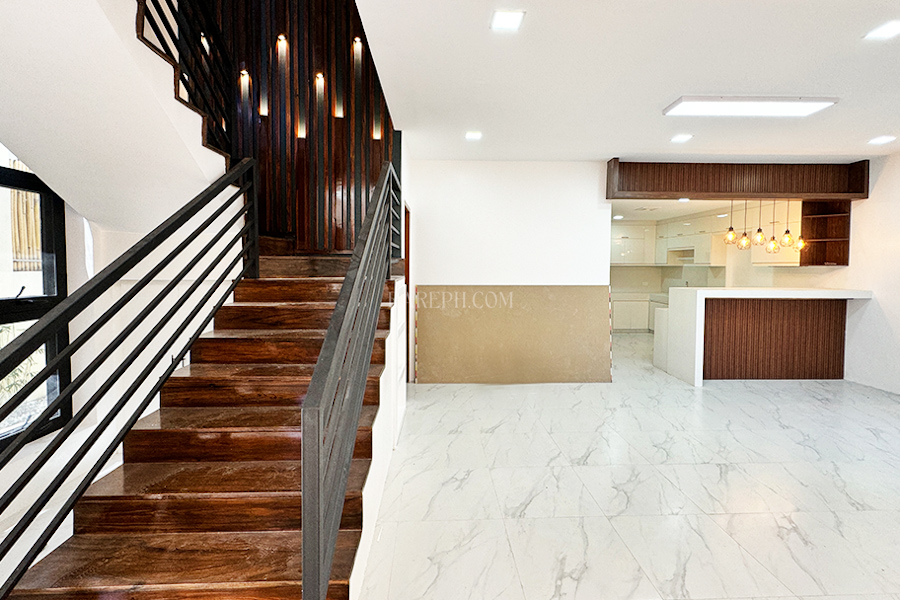 south forbes villas house for sale stairs and living room