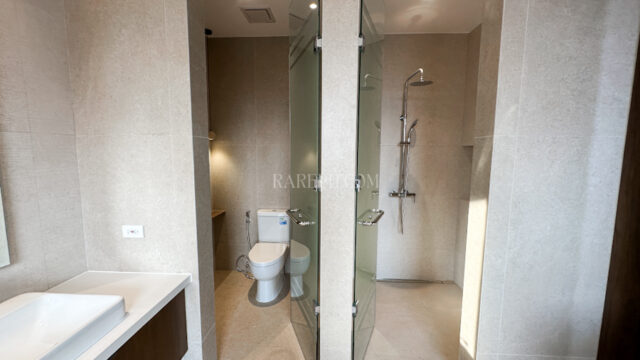 ayala westgrove heights house with pool villa serena primary suite toilet and shower